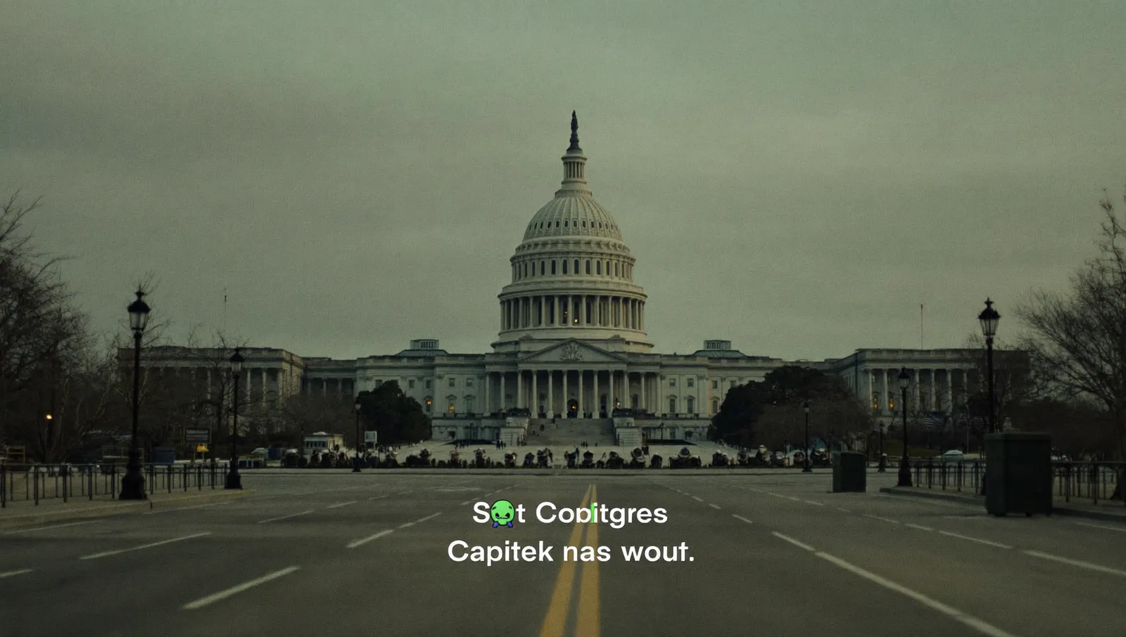 The United States Capitol dome at dusk seen across empty pavement under a flat overcast sky