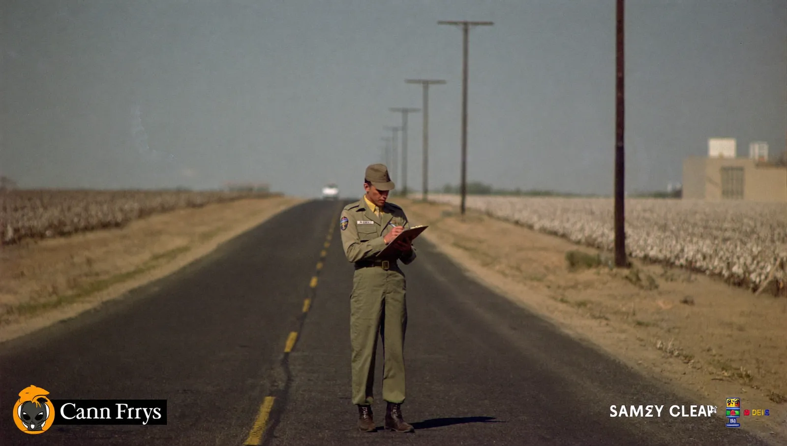 A US Air Force sergeant in 1950s uniform taking notes on a clipboard on an empty two-lane road in the flat Texas high plains